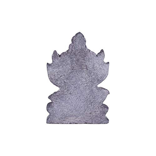 Back view of handcrafted black stone Ganesha idol showing natural stone texture and detailed carving finish.
